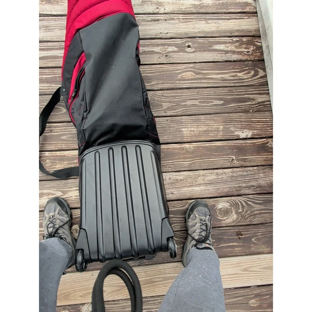 Used Bag Boy Golf Travel Case With Pivot Grip & Wheels - Black and Red
